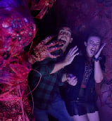 scare actor scaring someone